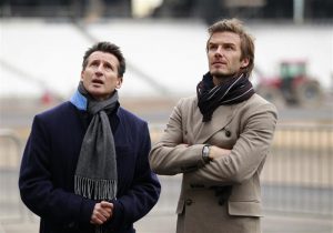 British soccer player David Beckham (R) and the Chair of the London 2012 Organising Committee, Sebastian Coe, pose for a photograph during a visit to the main Olympic stadium, in London November 29, 2010. REUTERS/Matt Dunham/Pool